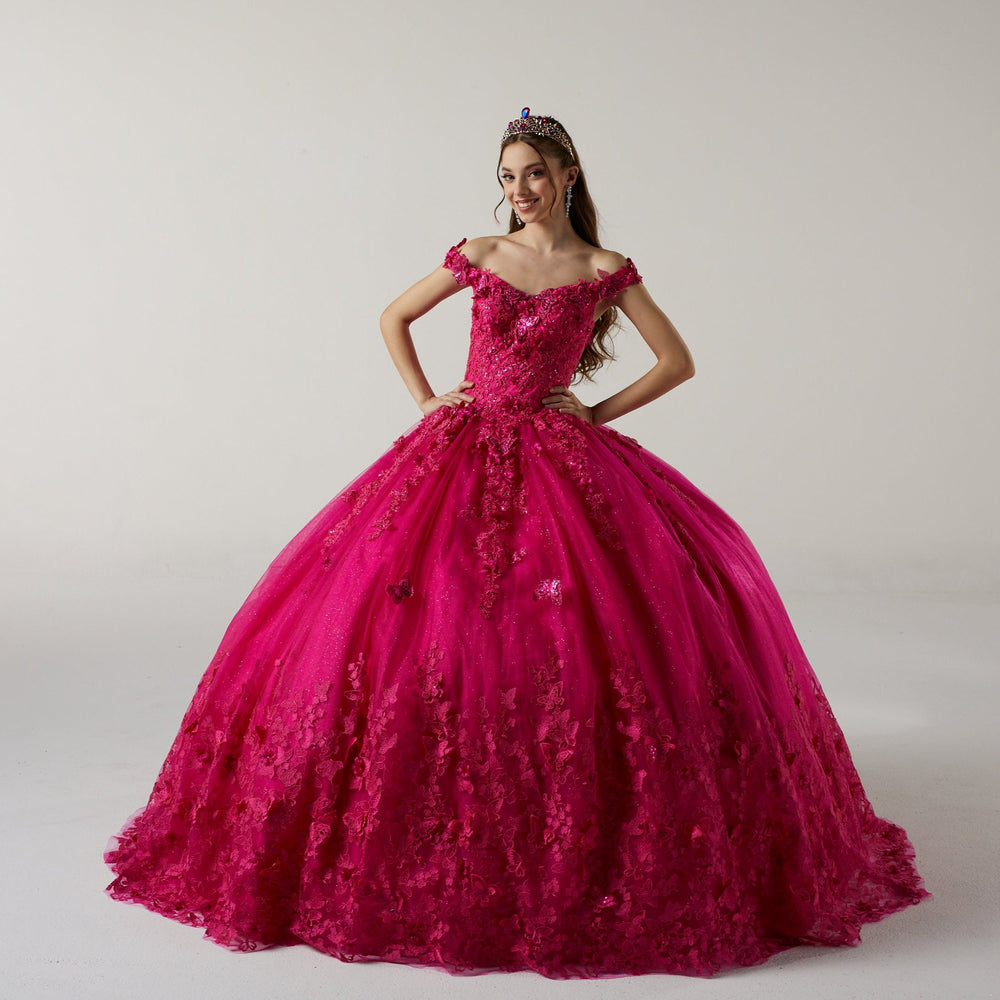 Vestido de quinceañera fushia con flores