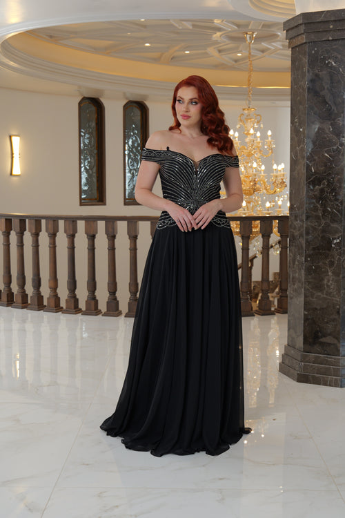 Vestido de fiesta negro con manga campesina