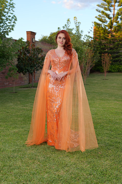 Vestido de fiesta naranja con mangas de tul