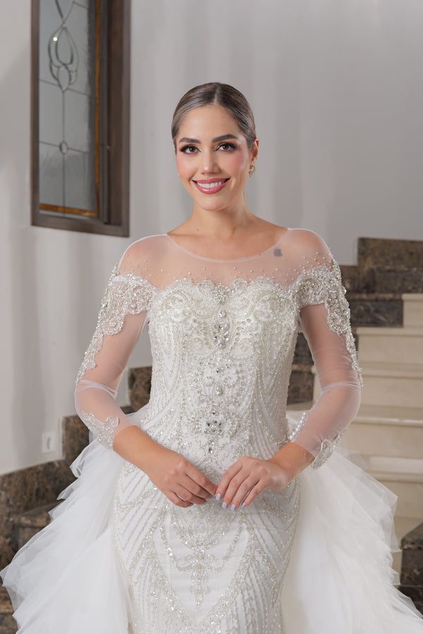 Vestido de novia corte sirena con pedreria de manga larga