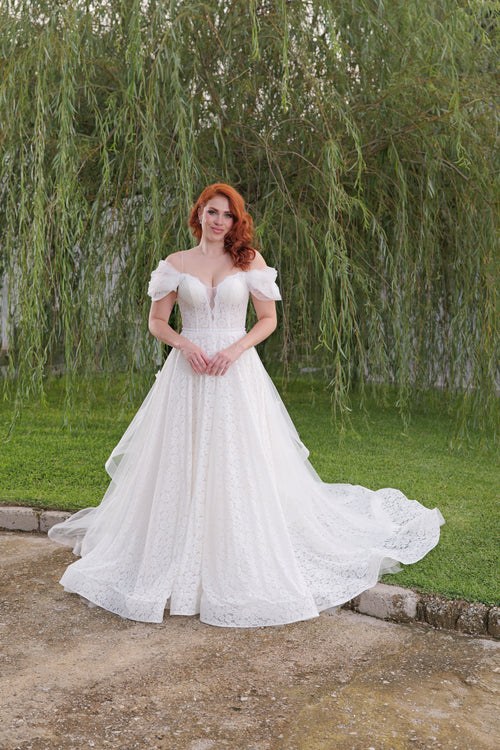 Vestido de novia de encaje con ma ga campesina